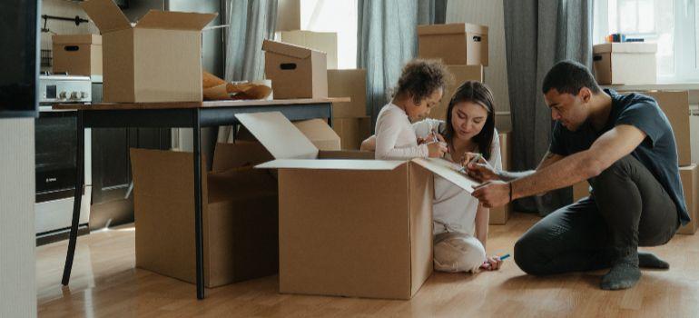 A family planning the essential things to do after a move