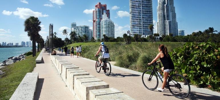 people driving bikes in Miami Beach 