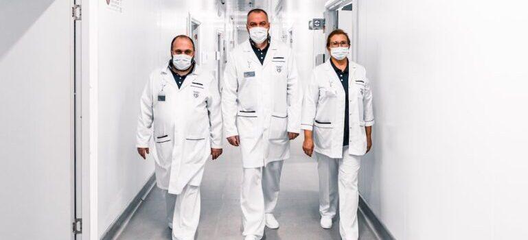 A group of doctors walking down the hall